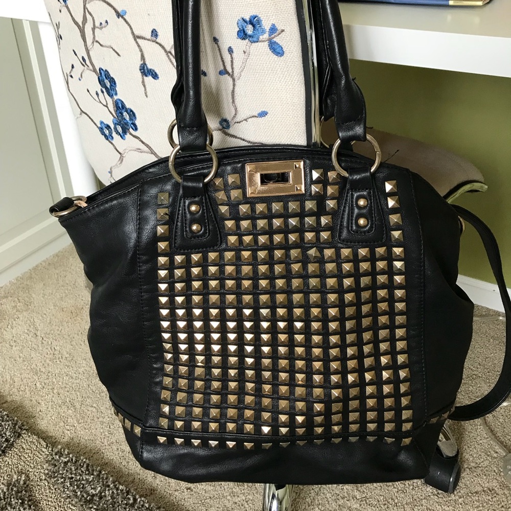 MMS Studio design black studs handbag.